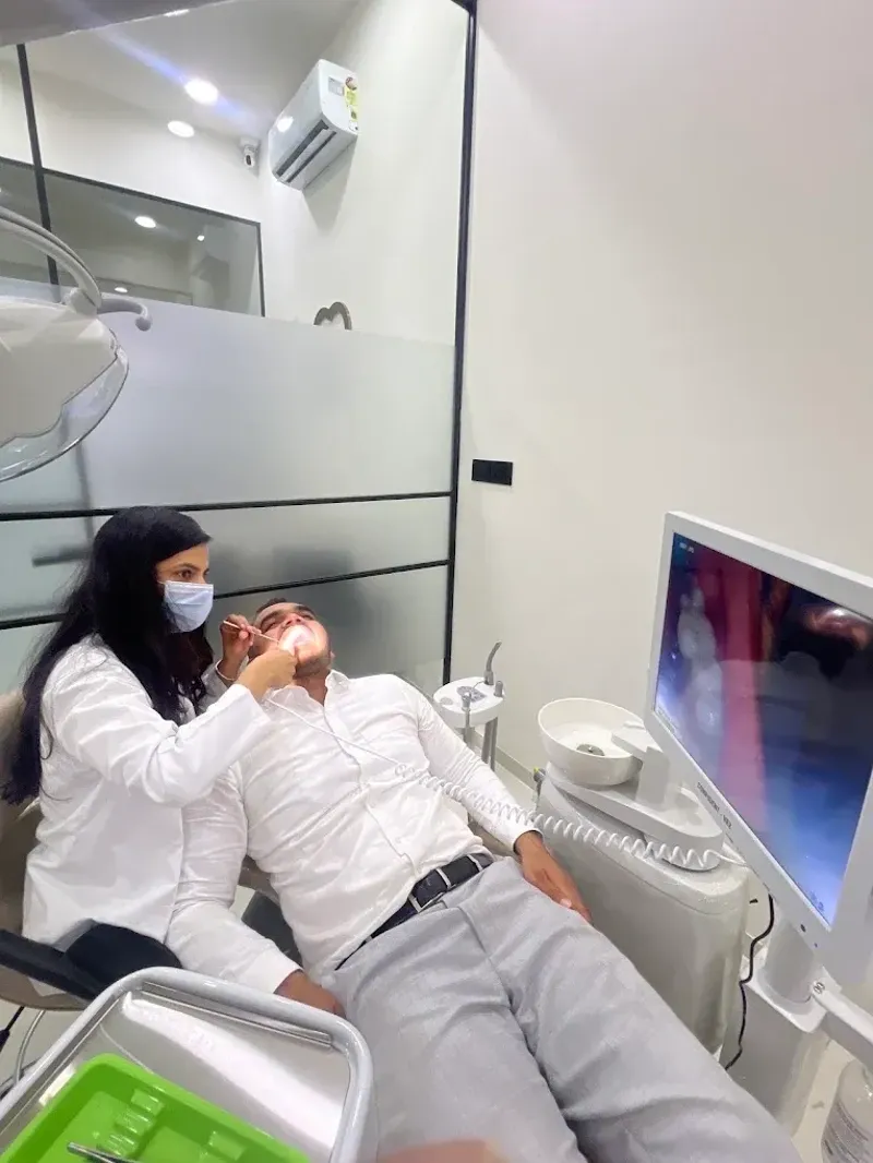 Magnified intraoral dental camera diagnosis image shown on chairside monitor screen to patient